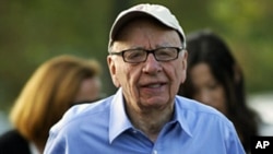 Rupert Murdoch, Australian-American media mogul and the chairman and chief executive of News Corporation, arrives at the Sun Valley Inn in Sun Valley, Idaho, July 7, 2011