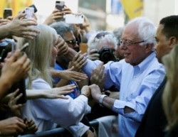 Democratic presidential candidate Bernie Sanders, I-Vt., participates in a rally alongside unions, hospital workers and community members against the closure of Hahnemann University Hospital in Philadelphia, July 15, 2019.