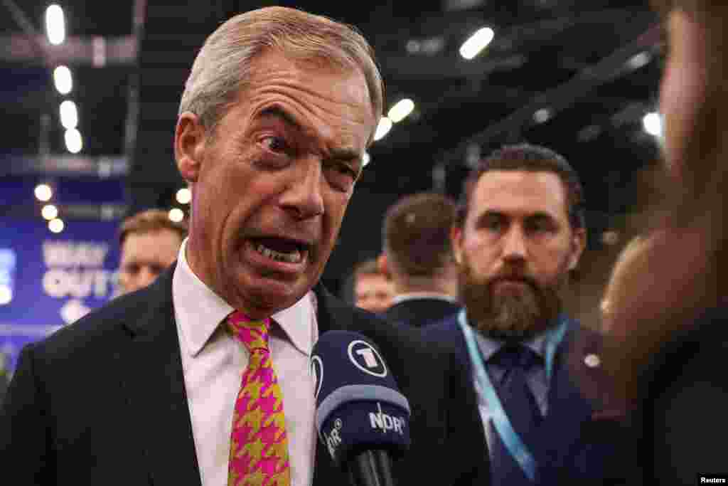 Reform UK party leader Nigel Farage speaks to the media at the Britain&#39;s Reform UK party&#39;s national conference in Birmingham, Britain.