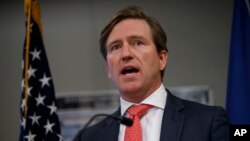 Christopher Krebs, undersecretary of the Department of Homeland Security's National Protection and Programs Directorate, speaks during a news conference on election cybersecurity, Oct. 19, 2018, in Arlington, Va.