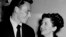 FILE - Singer Frank Sinatra and his wife Nancy smile broadly as they leave a Hollywood night club following a surprise meeting, Oct. 23, 1946. Nancy Sinatra Sr., the childhood sweetheart of Frank Sinatra has died. She was 101.