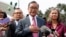 Cambodia's exiled opposition leader Sam Rainsy talks to the media outside Parliament House in Kuala Lumpur, Malaysia, Tuesday, Nov. 12, 2019. 