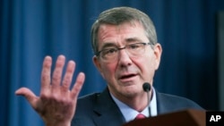 FILE - Defense Secretary Ash Carter, pictured at a Pentagon news conference, Jan. 28, 2016, says that although the U.S. and China have disagreements, Washington is committed to working through them in ways that do not destabilize the region. 