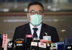 Li Kwai-wah, senior superintendent of National Security Department talks to reporters during a press conference in Hong Kong Wednesday, Jan. 6, 2021. About 50 Hong Kong pro-democracy figures were arrested by police on Wednesday under a national security l