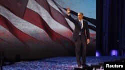 U.S. President Barack Obama celebrates after winning the U.S. presidential election in Chicago, Illinois, November 7, 2012. 