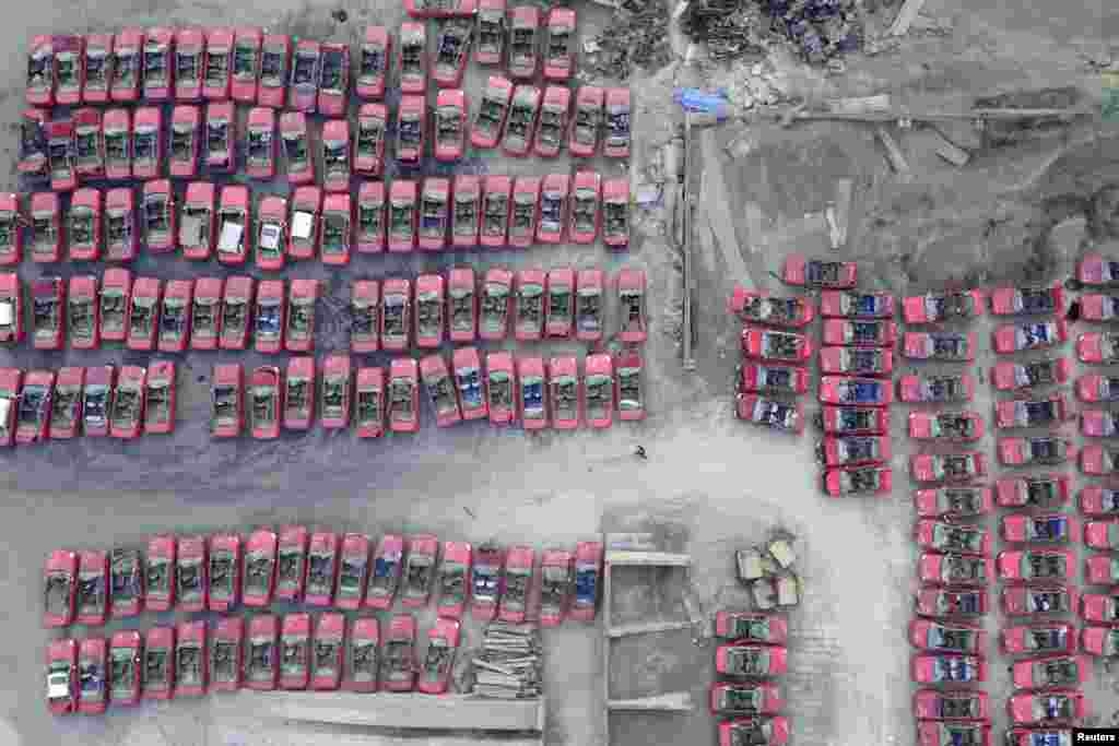 Scrapped taxis are seen in a parking lot in Taiyuan as the city is adapting to electric taxis, Taiyuan, Shanxi Province, China.