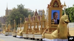 The royal funeral convoys are prepared ahead of the funeral procession for Cambodia's late King Norodom Sihanouk Thursday, Jan. 31, 2013, in Phnom Penh, Cambodia. The body of Sihanouk who died on Oct. 15, 2012 at age 89 is scheduled to be cremated on Feb. 4, 2013. (AP Photo/Heng Sinith)