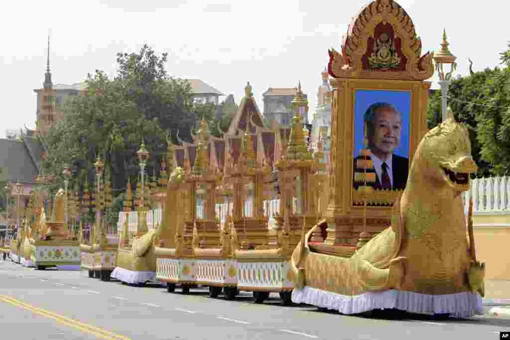 The royal funeral convoys are prepared ahead of the funeral procession for Cambodia&#39;s late King Norodom Sihanouk Thursday, Jan. 31, 2013, in Phnom Penh, Cambodia. The body of Sihanouk who died on Oct. 15, 2012 at age 89 is scheduled to be cremated on Feb. 4, 2013. (AP Photo/Heng Sinith)