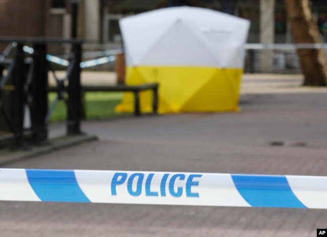 FILE - A police tent covers the spot where former Russian double agent Sergei Skripal and his daughter Yulia were found critically ill following a suspected exposure to an "unknown substance" in Salisbury, Britain, March 6, 2018.