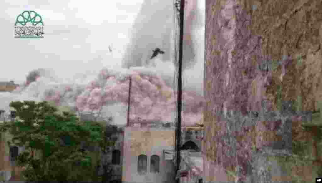 This scene taken from amateur video shows the explosion that destroyed the Carlton Hotel in Aleppo, May 8, 2014.