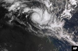 In a satellite image acquired from the Australian Bureau of Meteorology, Cyclone Trevor moves over the Northern Territory captured at 0810am AEDT, March 19, 2019.