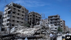شهر دوما در نزدیکی پایتخت سوریه که گفته می‌شود هدف حمله شیمیایی قرار گرفت- آرشیو