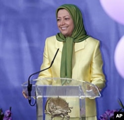 Mariam Rajavi, leader of the Council of Resistance of Iran (NCRI), speaks to supporters at a gathering in Auvers-sur-Oise, near Paris, France, July 17, 2010