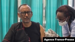 A handout picture released by Urugwiro Village, the office of the President, shows Rwanda's President Paul Kagame receiving the first injection of the COVID-19 vaccine at King Faisal hospital in Kigali. ( Urugwiro Village/AFP)