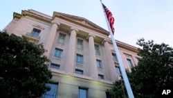 FILE - The Department of Justice headquarters building in Washington. 