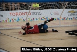 Jen Armbruster defends the goal for Team USA at the 2015 Parapan Games in Toronto.