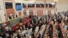 FILE - Ethiopia's Parliament prepares to swear in Prime Minister Abiy Ahmed in Addis Ababa, Ethiopia, on Oct. 4, 2021. Parliament approved on March 30, 2024, a change to the constitution that gives the president the power to appoint and dismiss the prime minister. 