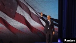 U.S. President Barack Obama celebrates after winning the U.S. presidential election in Chicago, Illinois.