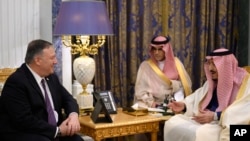 US Secretary of State Mike Pompeo, left, meets with Saudi King Salman, right, at the Royal Court in Riyadh, Saudi Arabia, Feb. 20, 2020.