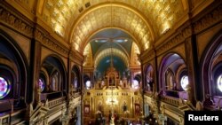 People visit the St. Stefan Bulgarian Orthodox Church in Istanbul, Jan. 7, 2018. 