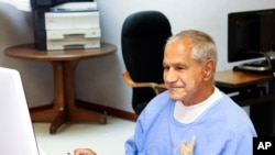 In this image provided by the California Department of Corrections and Rehabilitation, Sirhan Sirhan arrives for a parole hearing, Aug. 27, 2021, in San Diego. Sirhan fatally shot U.S. Sen. Robert F. Kennedy in 1968.