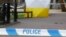 FILE - A police tent covers the spot in Salisbury, Britain, March 6, 2018, where former Russian double agent Sergei Skripal and his daughter Yulia were found critically ill following, as was later determined, their exposure to Soviet-era nerve agent Novichok.
