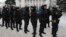 Riot police on duty stand outside the Parliament in Kyiv, Jan. 28, 2014. 