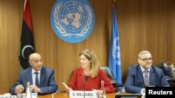 FILE: Speaker of the House of Representatives (HoR), Aguila Saleh, U.N. Special Adviser on Libya, Stephanie Williams and President of the High State Council of State (HSC), Khaled Al-Mishri, during a meeting at the U.N. in Geneva on June 28, 2022.