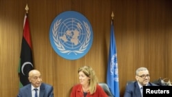 FILE: (L-R) Speaker of the House of Representatives (HoR), Aguila Saleh, United Nations Special Adviser on Libya, Stephanie Williams and President of the High State Council of State (HSC), Khaled Al-Mishri, meeting in Geneva, Switzerland, June 28, 2022.