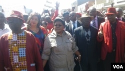 Inkokheli yamabandla aphikisa elibusayo - uMnu. Morgan Tsvangirai loNkosikazi Joice Mujuru.