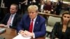 Former US President Donald Trump sits in New York State Supreme Court during the civil fraud trial against the Trump Organization, in New York City on January 11, 2024.