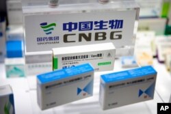 A box for a COVID-19 vaccine is displayed at an exhibit by Chinese pharmaceutical firm Sinopharm at the China International Fair for Trade in Services (CIFTIS) in Beijing, China, Sept. 5, 2020.