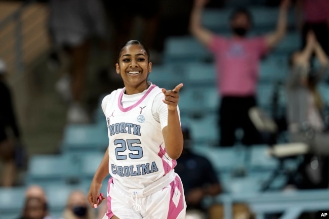 FILE - Deja Kelly at the University of North Carolina has six deals, including Dunkin’ Donuts and Outback Steakhouse. (AP Photo/Gerry Broome, File)