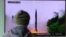 A man in South Korea watches a TV news program showing a reported missile launch conducted by North Korea, Oct. 20, 2016. The U.S. military called the event a "failed" North Korean missile launch.