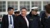 U.S. Secretary of State Mike Pompeo walks on the tarmac as he leaves Germany after taking part in the 56th Munich Security Conference (MSC) in Munich, southern Germany, Feb. 15, 2020.