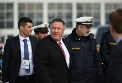 FILE - U.S. Secretary of State Mike Pompeo walks on the tarmac as he leaves Germany after taking part in the 56th Munich Security Conference in Munich, southern Germany, Feb. 15, 2020.