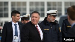U.S. Secretary of State Mike Pompeo walks on the tarmac as he leaves Germany after taking part in the 56th Munich Security Conference (MSC) in Munich, southern Germany, Feb. 15, 2020.