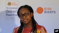  Divina Maloum of Cameroon, joint winner of the 2019 Children's Peace Prize with climate change activist Greta Thunberg, poses for a picture prior to the award ceremony in The Hague, Netherlands, Nov. 20, 2019.