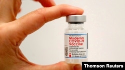 FILE PHOTO: SOMOS Community Care administers Moderna COVID-19 Vaccine at pop-up site in New York