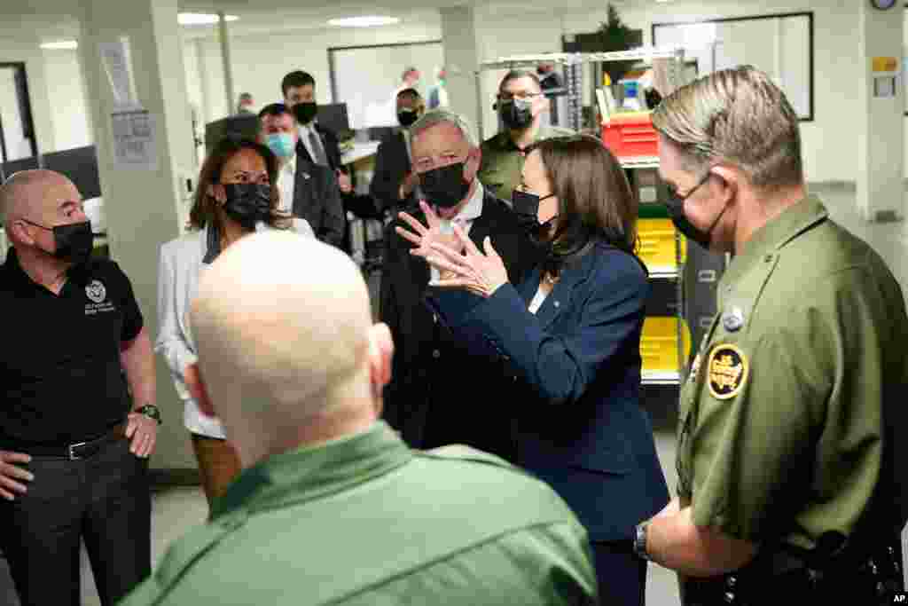 Vice President Kamala Harris tours the U.S. Customs and Border Protection Central Processing Center, Friday, June 25, 2021, in El Paso, Texas, with from left, Homeland Security Secretary Alejandro Mayorkas, Rep. Veronica Escobar, D-Texas.