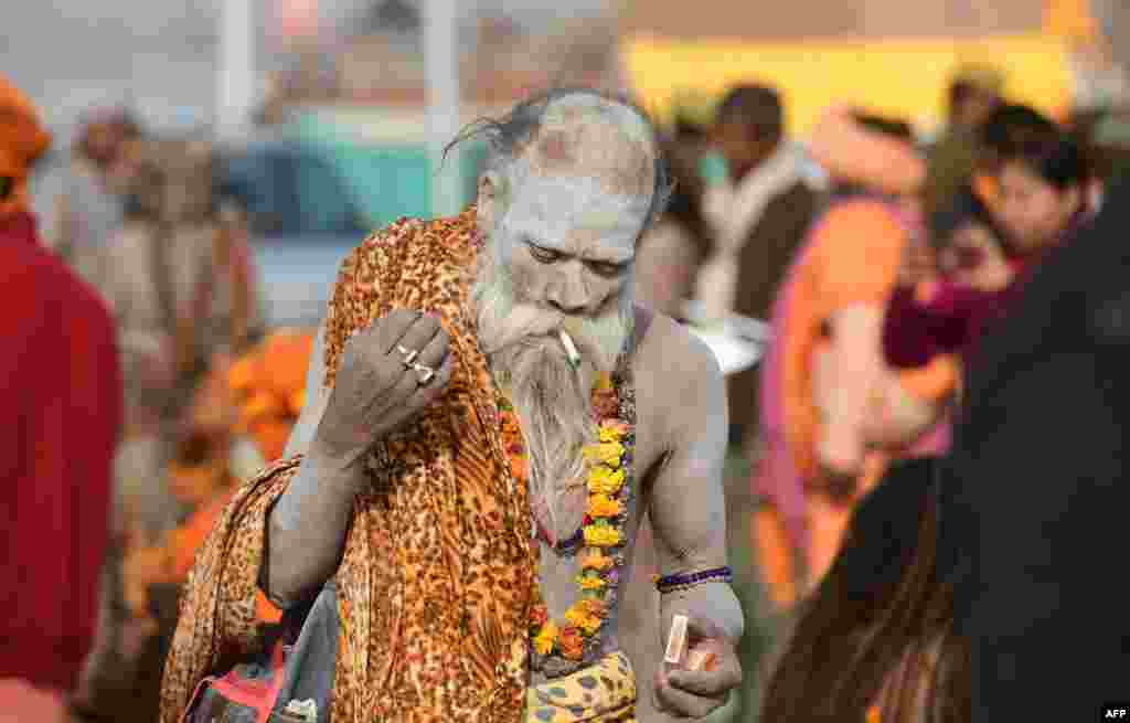 Indian Hindu sadhus (holy men) from the Juna Akhara take part in a religious procession towards Sangam area, during the first &#39;royal entry&#39; for the Kumbh Mela in Allahabad, Dec. 25, 2018.