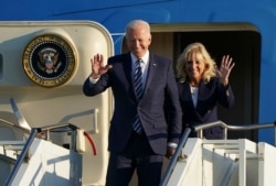 U.S. President Joe Biden and first lady Jill Biden arrive at RAF Mildenhall, England, ahead of the G-7 summit in Cornwall, June 9, 2021.