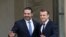 French President Emmanuel Macron, right, poses for photographers with Lebanon's Prime Minister Saad Hariri prior to their meeting at the Elysee Palace in Paris, Saturday, Nov. 18, 2017.