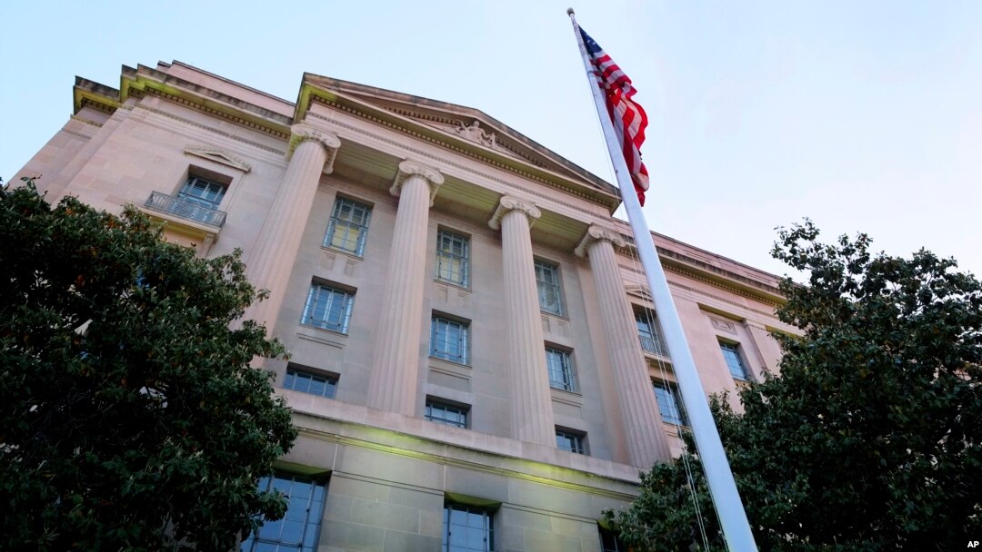 FILE - The Department of Justice headquarters building in Washington. 