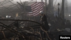 En Queens, Nueva York, aún están las huellas de 'Sandy'. El pavoroso incendio consumo decenas de viviendas.