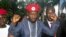 Ugandan pop star and opposition figure Bobi Wine, whose real name is Kyagulanyi Ssentamu, greets his followers as he arrives home after being released from prison on bail in Kampala, Uganda, May 2, 2019. 