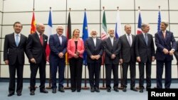 Участники заключения соглашения между Ираном и шестью мировыми державами об ограничении иранской ядерной программы. Вена, Австрия. 14 июля 2016 г.