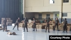 Troops move U.S.-provided goods that are being stored in Brazil for distribution to Venezuela. (Photo Courtesy of Gregory Holliday)