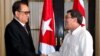 North Korea's Foreign Minister Ri Su Yong, left, shakes hands with Cuba's Foreign Minister Bruno Rodriguez during a photo opportunity before their meeting in Havana, Cuba, March 16, 2015.