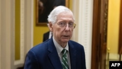 FILE — US Senate Minority Leader Mitch McConnell speaks to the press after voting on the continuing resolution passed by the House earlier in the day on Capitol Hill in Washington, DC Sept 30, 2023.